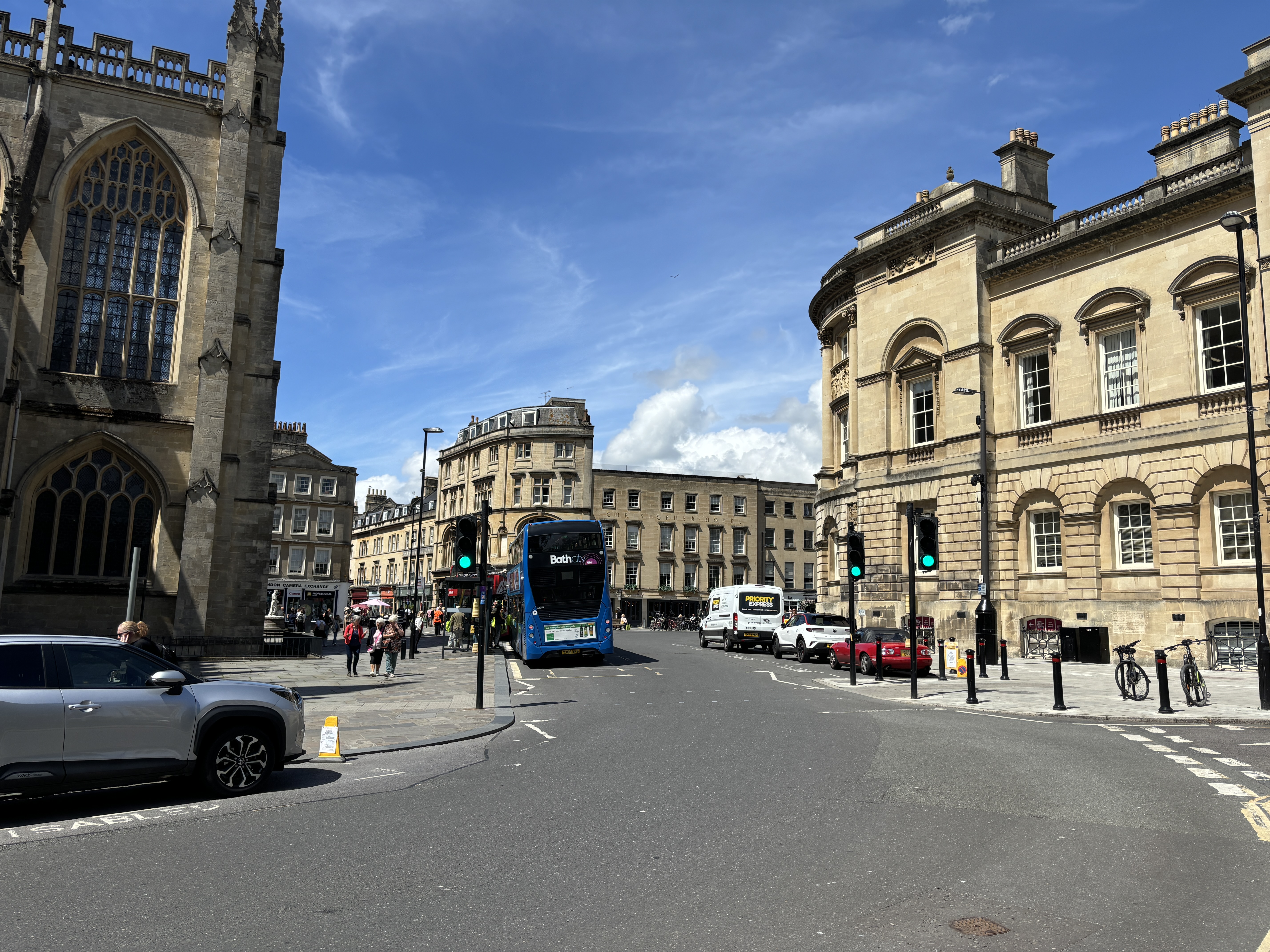 Turn left, around the Abbey and towards the city centre shops